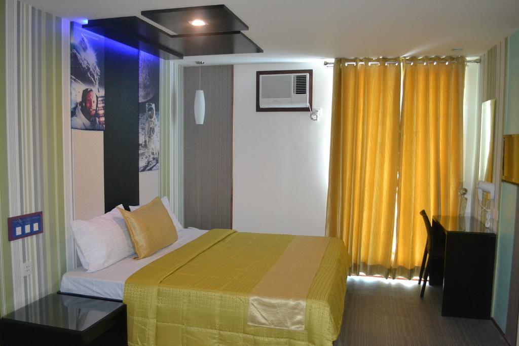 Icon Hotel North Edsa Кесон-Сіті Номер фото