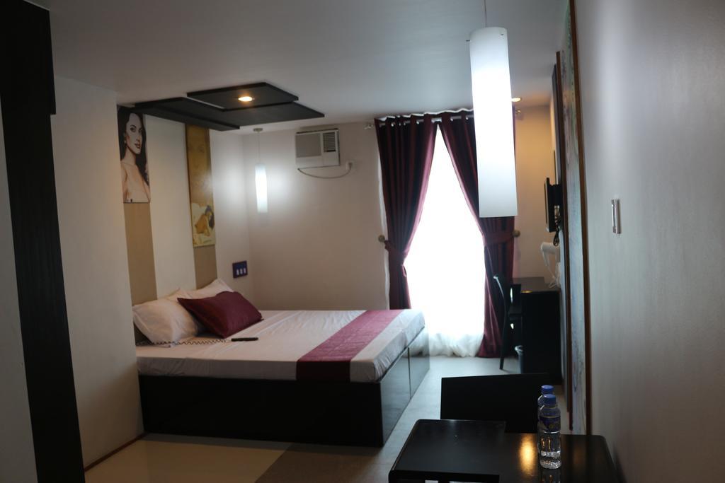 Icon Hotel North Edsa Кесон-Сіті Номер фото